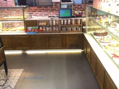 供应各种收银台 中岛柜、出炉柜 边柜、面包展柜 、蛋糕模型柜、冷柜。厂家直销定制图1